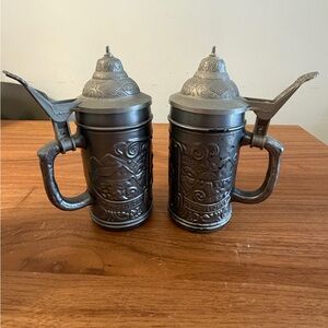 Vintage Embossed Pewter Beer Steins Pair - Gray. Glass interior.
